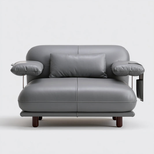 Modern Cavelyx convertible lounge armchair with sleek gray upholstery, featuring clean lines and a comfortable design.