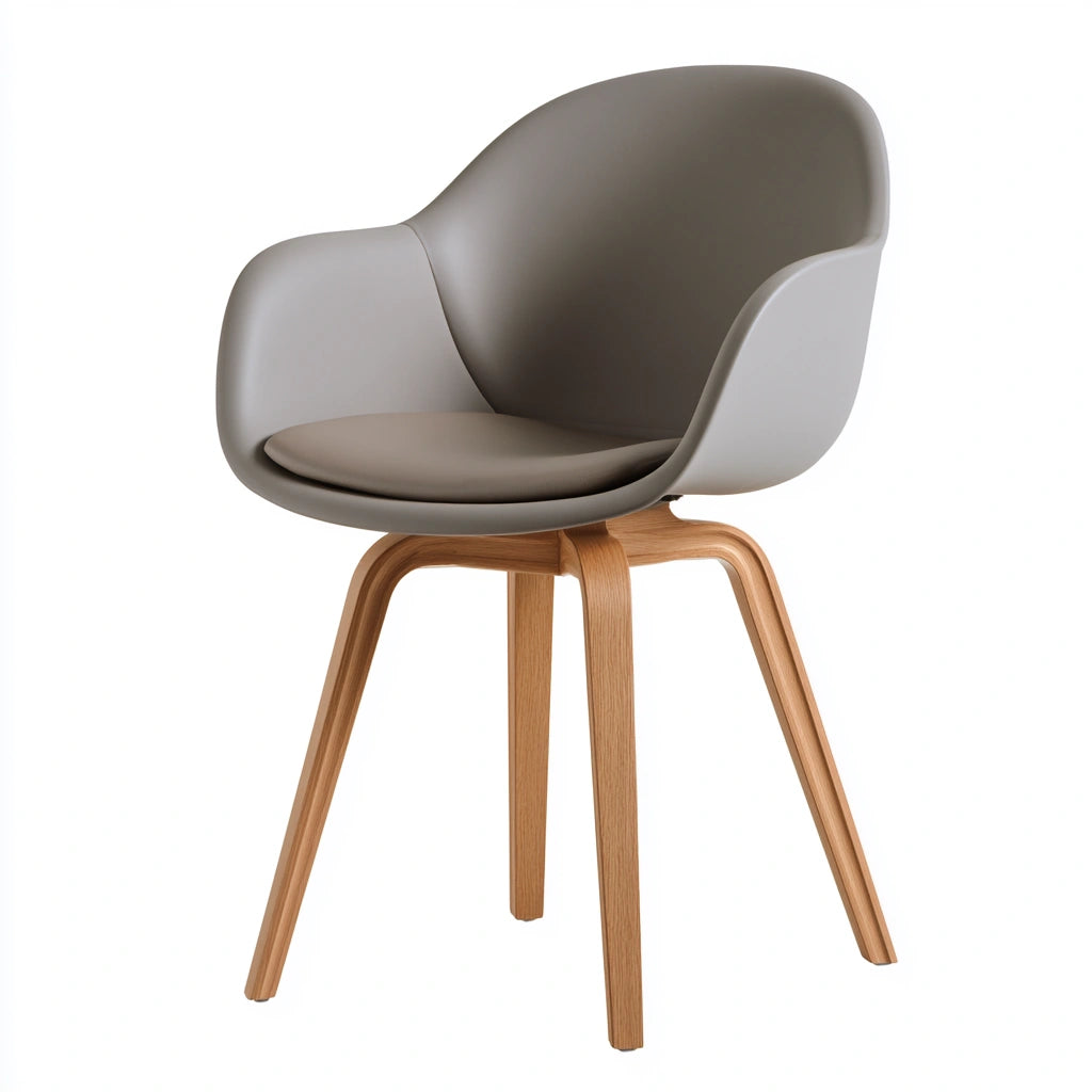 Modern gray molded plastic dining chair by Cavelyx with sleek, contoured design and clean lines for contemporary dining rooms.